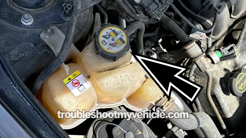 Coolant Shooting Out Of The Coolant Expansion Tank. How To Test For A Blown Head Gasket (2001, 2002, 2003, 2004, 2005, 2006, 2007, 2008, 2009, 2010, 2011, 2012 3.0L V6 Ford Escape, Mercury Mariner, And Mazda Tribute) Coolant Shooting Out Of The Coolant Expansion Tank. How To Test For A Blown Head Gasket (2001, 2002, 2003, 2004, 2005, 2006, 2007, 2008, 2009, 2010, 2011, 2012 3.0L V6 Ford Escape, Mercury Mariner, And Mazda Tribute)